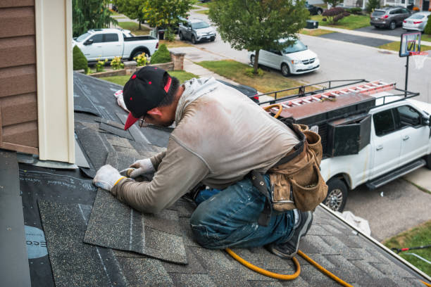Professional Roofing technician working in Mossville, IL